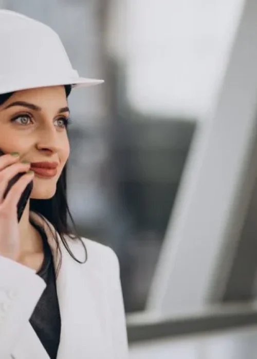optimize-young-business-woman-wearing-hard-hat-building-object.webp